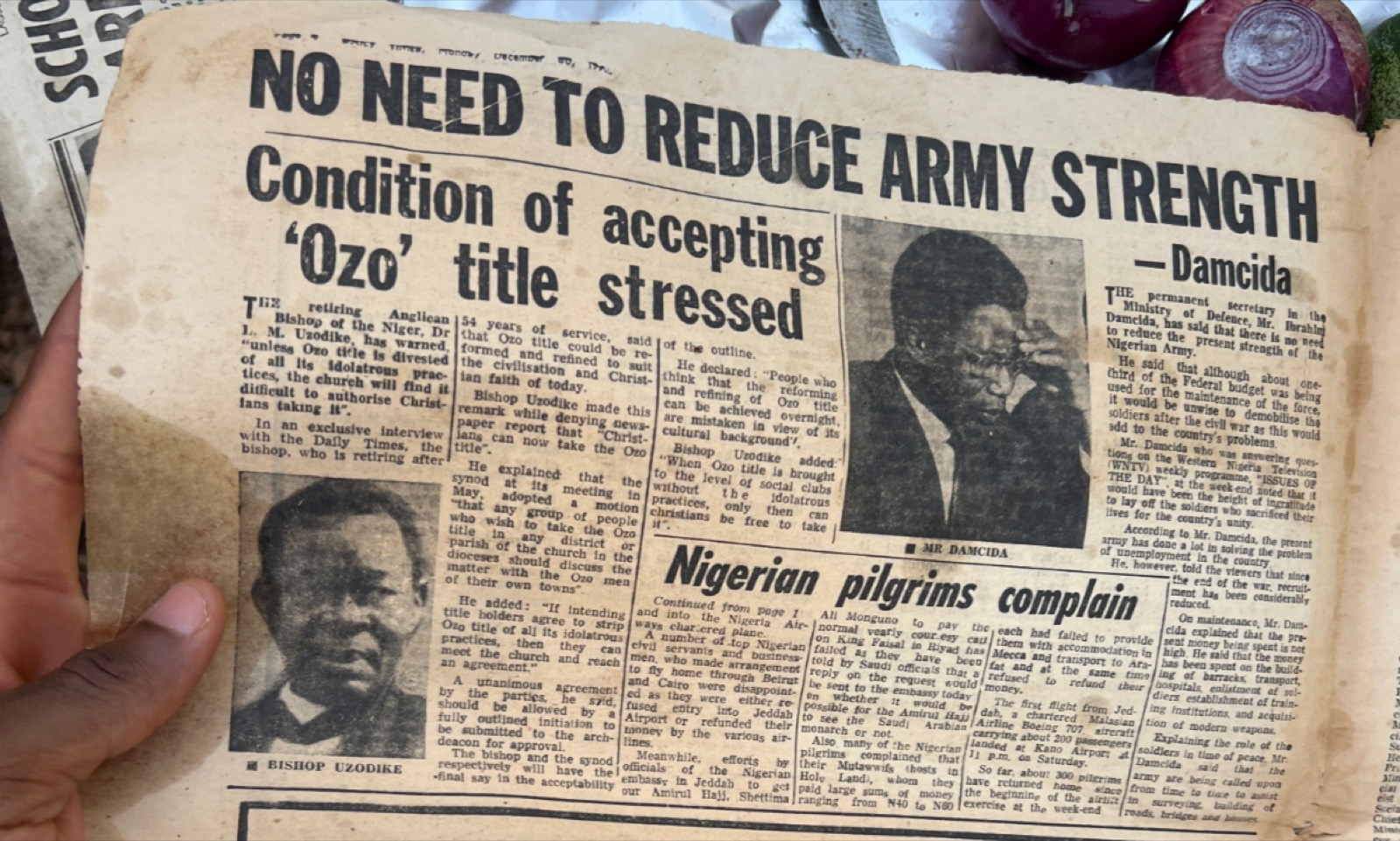 A 1974 Daily Times page used as a suya wrapper, with headlines on army strength and the Ozo title